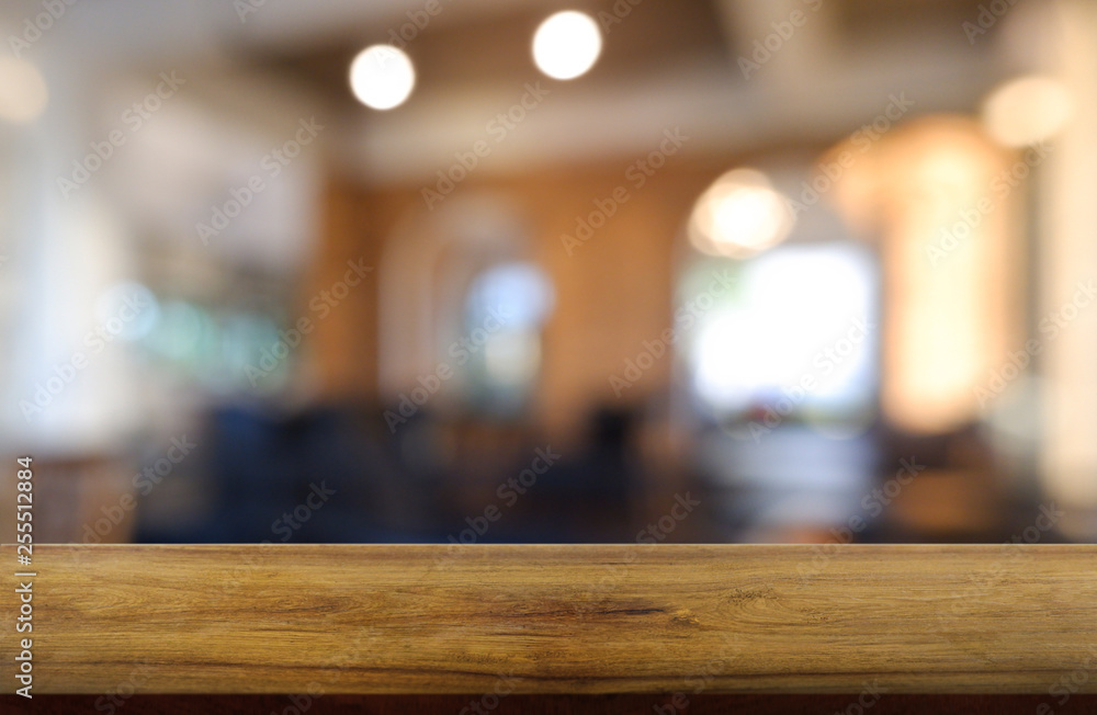 Empty wooden table in front of abstract blurred background of restaurant, cafe and coffee shop interior. can be used for display or montage your products - Image. Empty wooden table in front of abstract blurred background of restaurant, cafe and coffee shop interior. can be used for display or montage your products - Image.