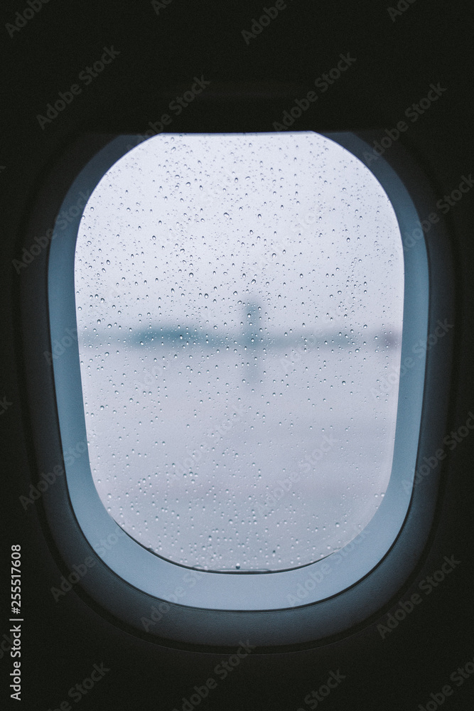 rain drops on airplane window