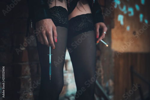 Bild auf Leinwand Prostitution and drug addiction are criminal illegal activities in the modern city
