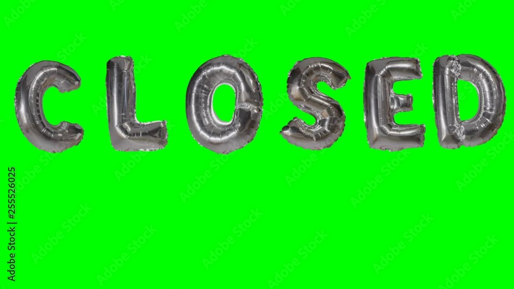 Word closed from helium silver balloon letters floating on green screen Word closed from helium silver balloon letters floating on green screen
