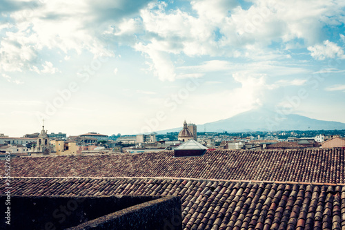 Catania aerial cityscape with Mount Etna, active volcano on the east coast of Sicily, Italy.