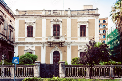 Beautiful cityscape of Italy, historical street of Catania, Sicily, facade of old buildings. © Inna