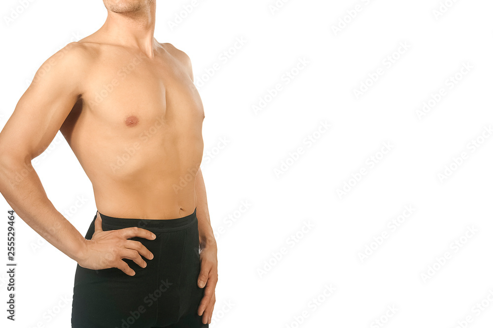 Fototapeta premium Male black thermal underwear for active winter sport. Man wearing Thermolinen on white background. Topless, but in leggings