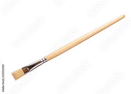 Vászonkép New wooden artist painting brush, isolated on white background