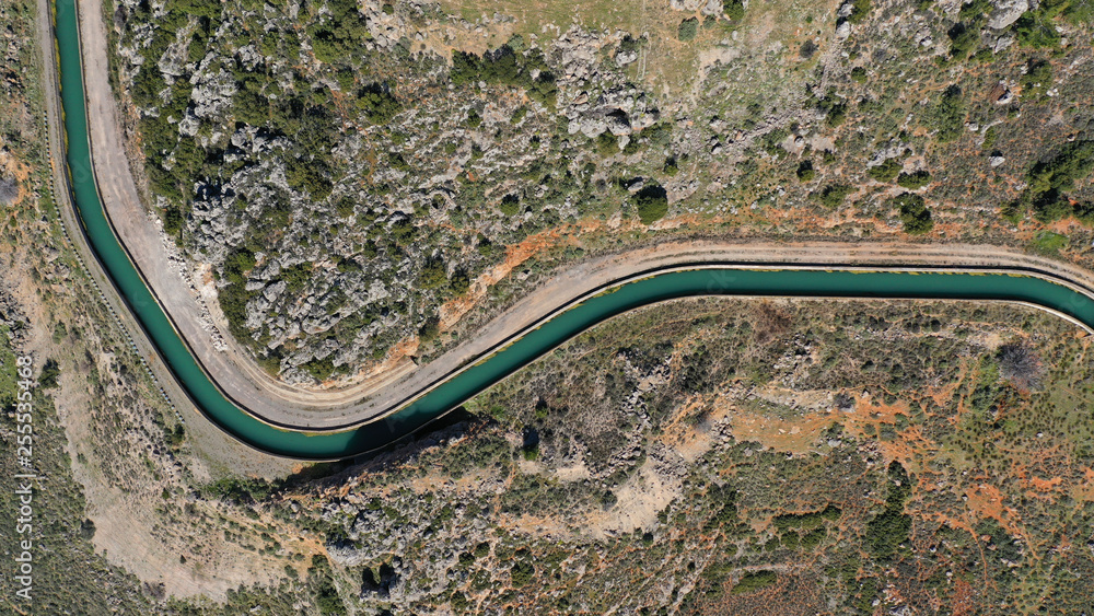 Aerial drone top view photo of snake curvy winding road built in steep mountain slope