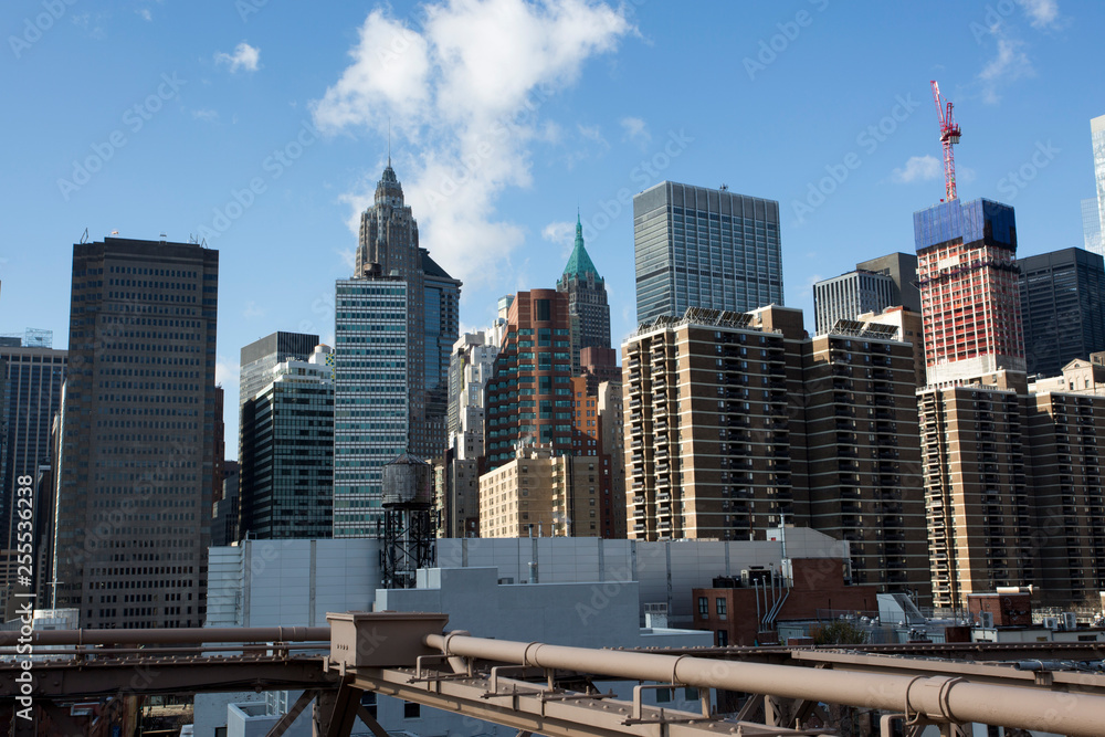 The skyline of Manhattan, New York seen from the Brooklyn Bridge The skyline of Manhattan, New York seen from the Brooklyn Bridge