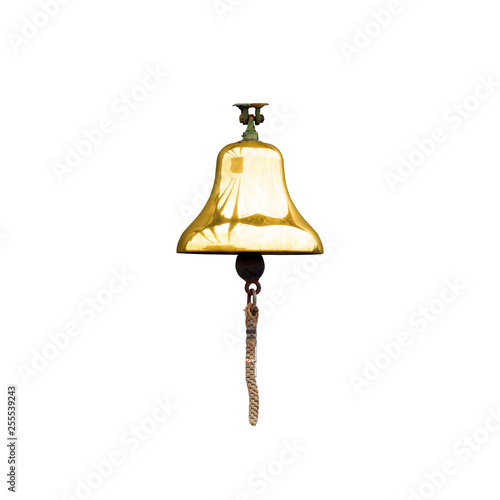 Old metal ship's bell with a rope, rynda. Bell isolated on white background photo