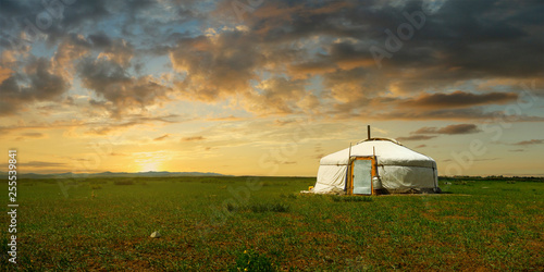 Fotografiet sunset on a yurt , in the grassland of Mongolia