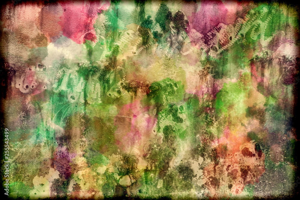 Obraz premium Watercolor multi colored texture effect background of pink, blue red green purple yellow colors with a black blended border