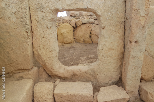 Obraz na płótnie Window view of ancient limestone structures of Hagar Qim and Gnajdra Temples in Qrendi, Malta w salonie