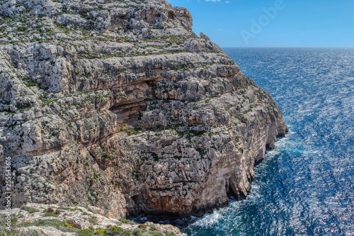 Obraz na płótnie Views of rocky coast on a sunny day with blue sky, Malta w salonie