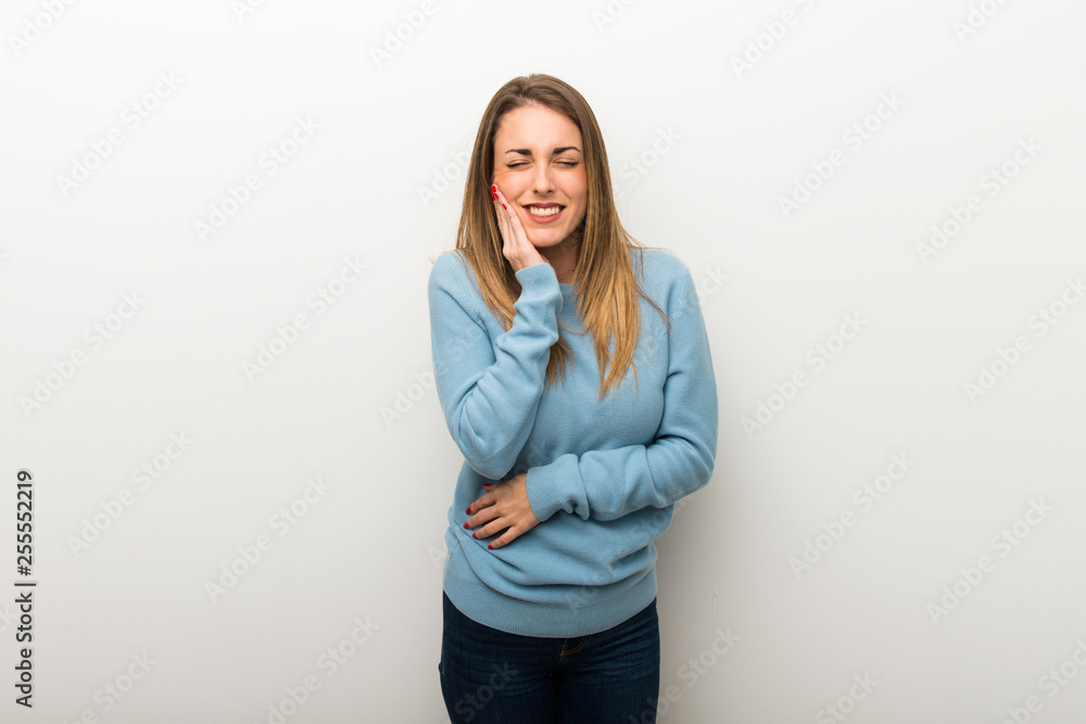 Blonde woman on isolated white background with toothache Blonde woman on isolated white background with toothache