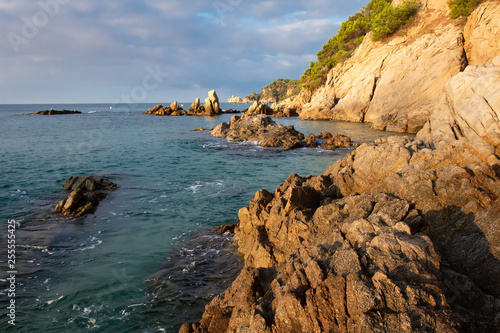 Sea nature landscape with rocks and cliff in sea near Cala de Boadella beach