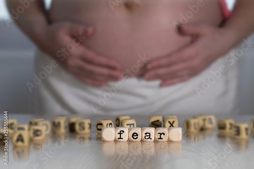 Word FEAR composed of wooden letters.