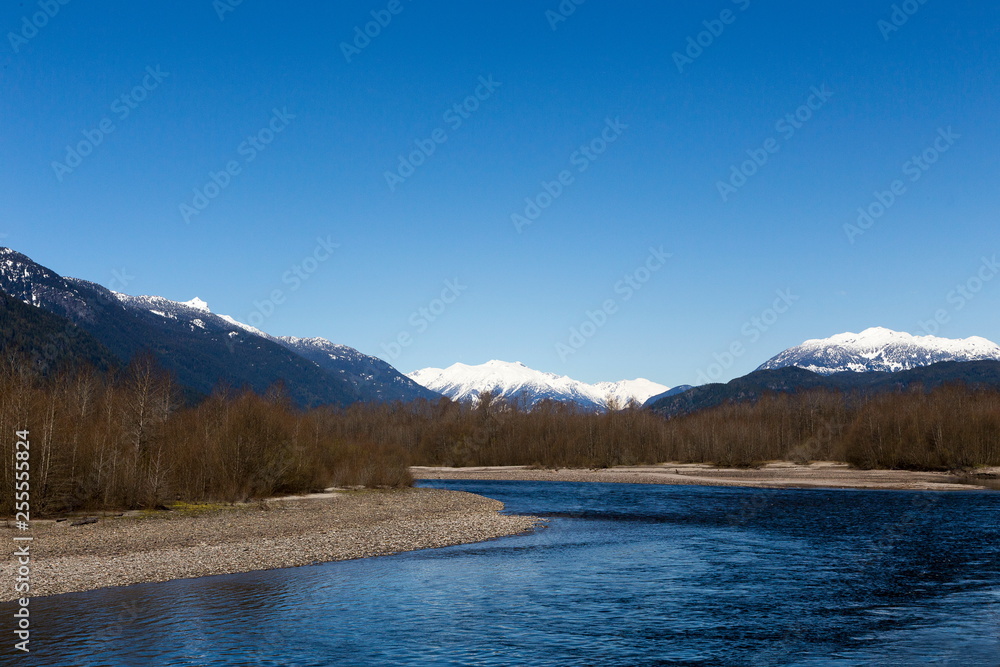 The Squamish River and snow-peaked Coast mountains in the Brackendale Eagles Provincial Park in April, British Columbia, Canada