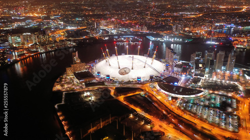 Aerial night shot from iconic public O2 Arena in Greenwich Peninsula, London, United Kingdom