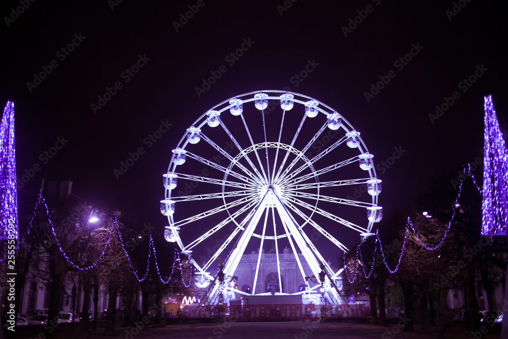 Ferris wheel at the night. Bright and futuristic.