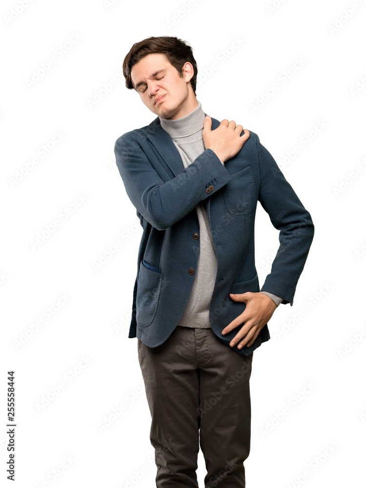 Teenager man with turtleneck suffering from pain in shoulder for having made an effort over isolated white background Teenager man with turtleneck suffering from pain in shoulder for having made an effort over isolated white background