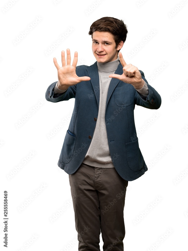 Teenager man with turtleneck counting seven with fingers over isolated white background Teenager man with turtleneck counting seven with fingers over isolated white background