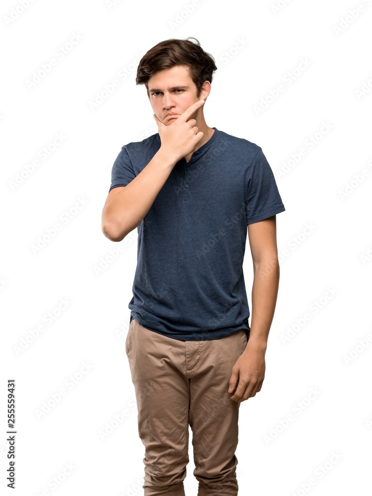 Teenager man thinking over isolated white background Teenager man thinking over isolated white background