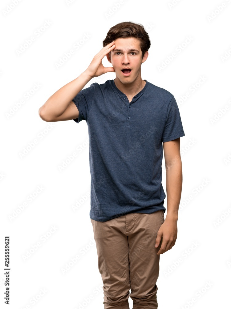 Teenager man has just realized something and has intending the solution over isolated white background Teenager man has just realized something and has intending the solution over isolated white background