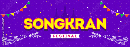 Songkran festival celebration header banner or poster design on purple background with water gun and bunting decoration.