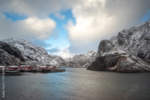 Beautiful traditional fishing red rorbuer huts in Nusfjord village, Lofoten Islands, Norway, Scandinavia photo