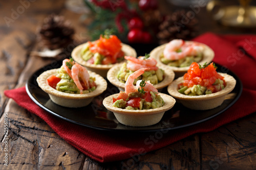 Shrimp and salmon appetizers with avocado cream