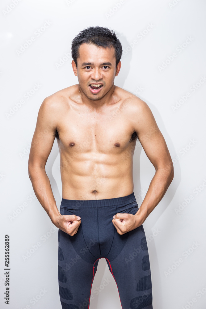 Smart asian muscle athletic man posting on white background, Fitness muscle man