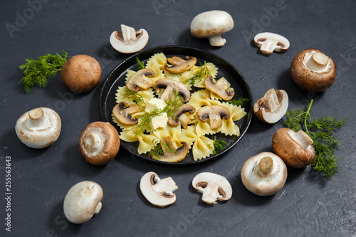 Homemade pasta with mushrooms. Delicious rustic dish, one large portion.