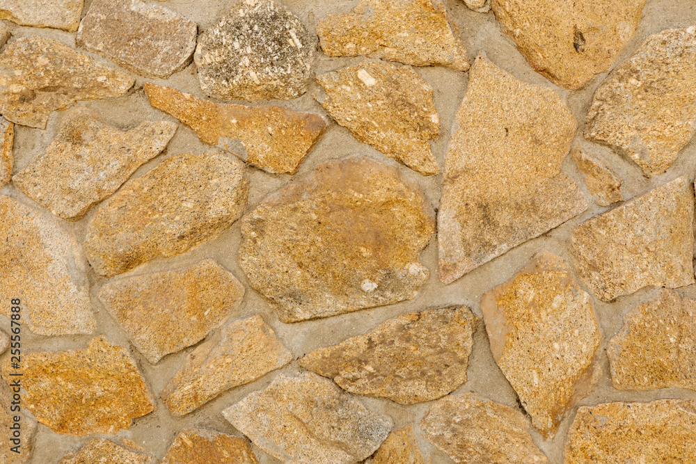 Fototapeta premium Stone wall closeup