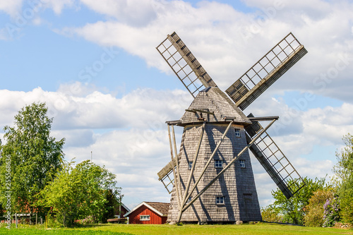 Windmill at a farm in a rural landscape