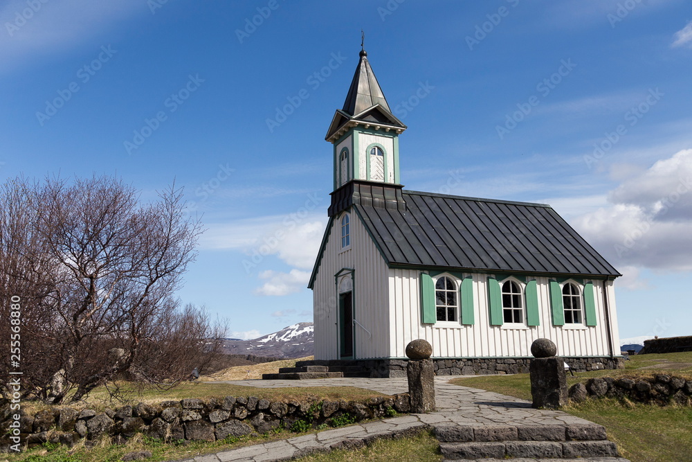 Thingvallakirkja Church in the valley of Thingvellir National Park in Iceland's Golden Circle during a beautiful sunny spring day