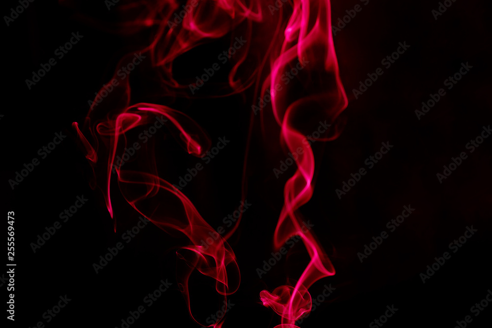 Obraz premium Red Smoke on Black background.
