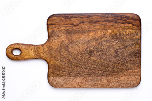 Wooden kitchen board on a white background top view