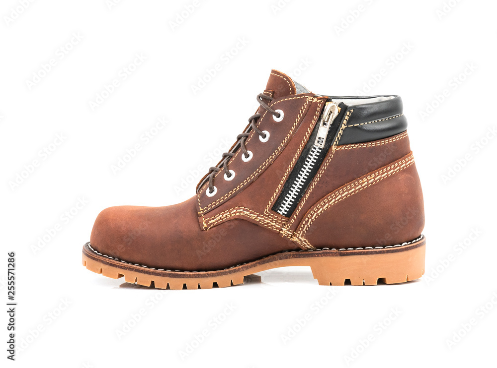 Brown boot with zipper isolated on a white background. Brown boot with zipper isolated on a white background.