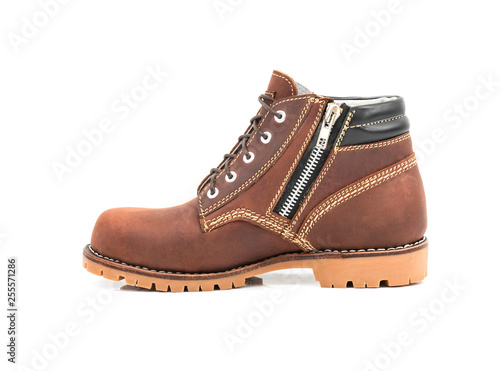 Brown boot with zipper isolated on a white background. © StepPro