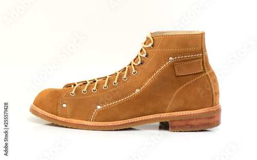 Men’s brown boot with nubuck leather for man collection isolated on a white background.