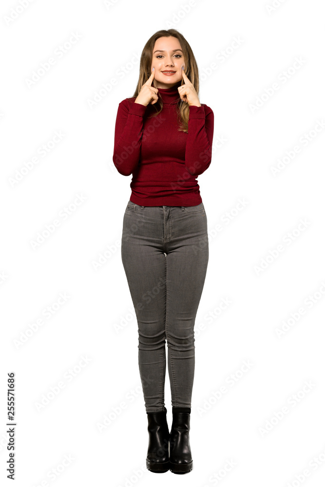 A full-length shot of a Teenager girl with turtleneck smiling with a happy and pleasant expression over isolated white background A full-length shot of a Teenager girl with turtleneck smiling with a happy and pleasant expression over isolated white background