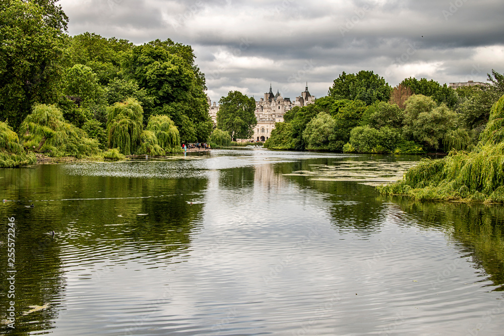 view of Buckingham Palace from St James Park in London England view of Buckingham Palace from St James Park in London England