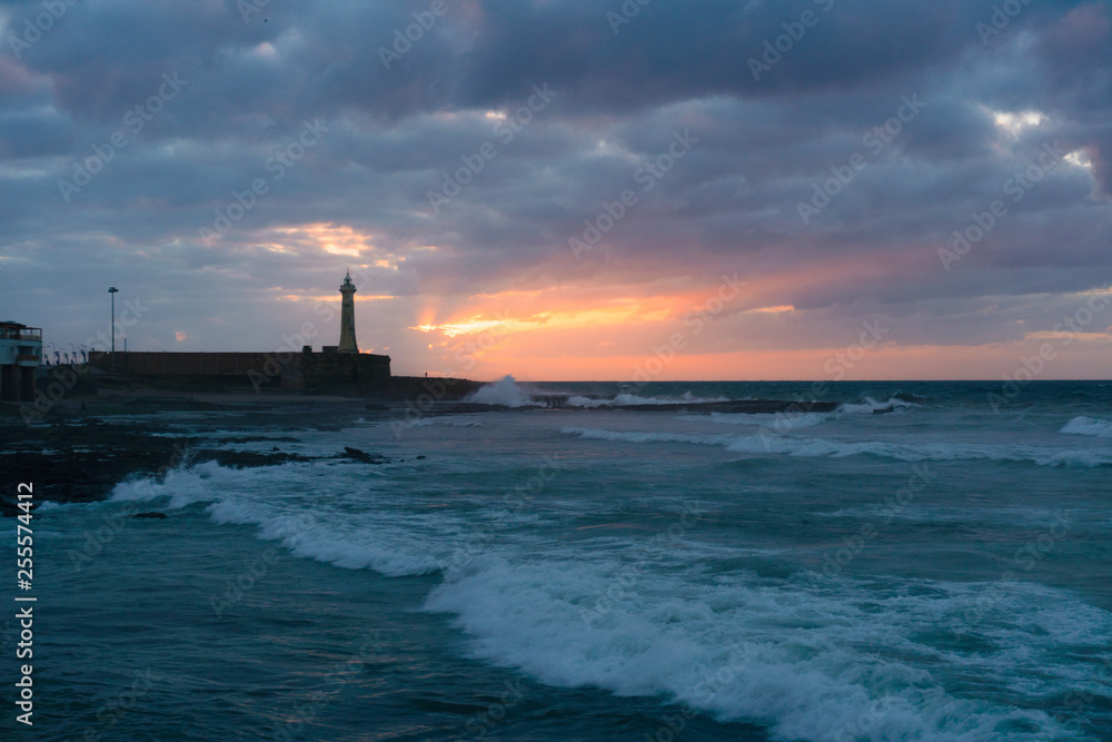 Sunset time View on the Atlantic Ocean and Lighthouse in Rabat, The capital of Morocco