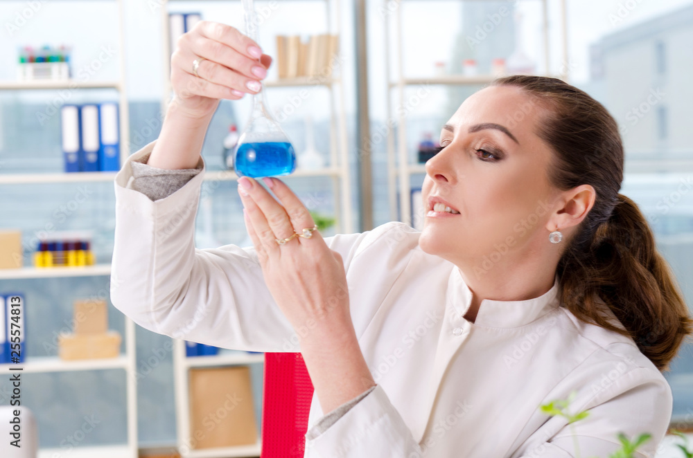 Female biotechnology scientist chemist working in the lab Female biotechnology scientist chemist working in the lab
