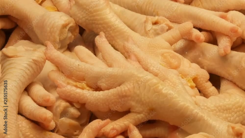 A large number of chicken giblets, entrails, wings, legs, stomachs