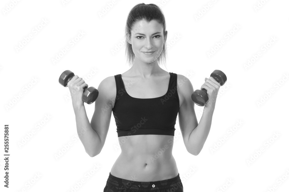 Beautiful young woman exercise with dumbbells Beautiful young woman exercise with dumbbells