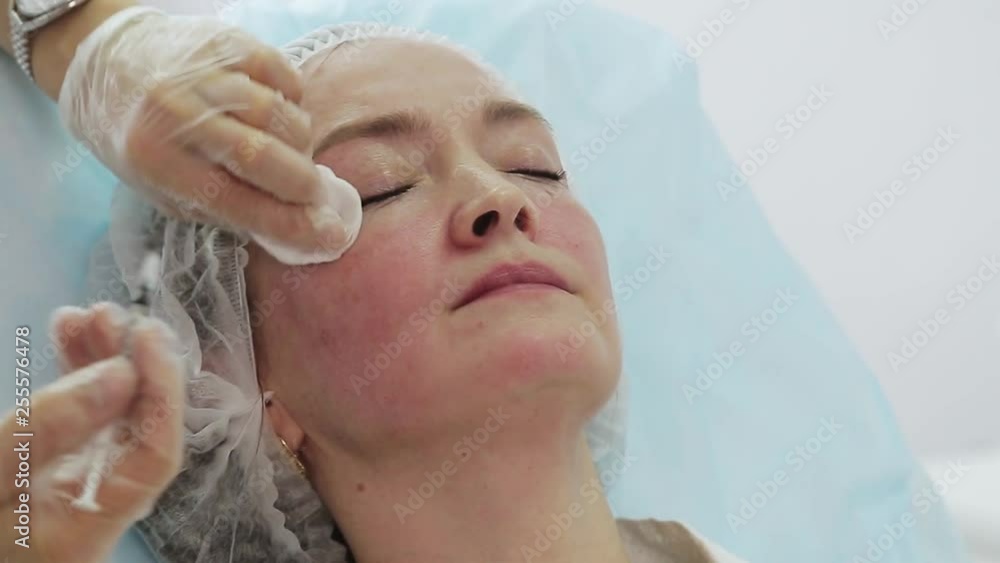 Face skin lifting injections. Beautician making botox injections. glabellar frown line care. Female face rejuvenation Face skin lifting injections. Beautician making botox injections. glabellar frown line care. Female face rejuvenation