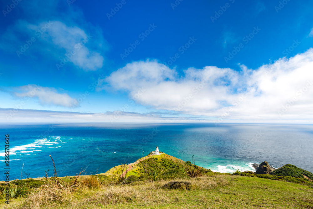 Lighthouse at Cape Reinga, with Tasman Sea and Pacific, Northland, New Zealand Lighthouse at Cape Reinga, with Tasman Sea and Pacific, Northland, New Zealand