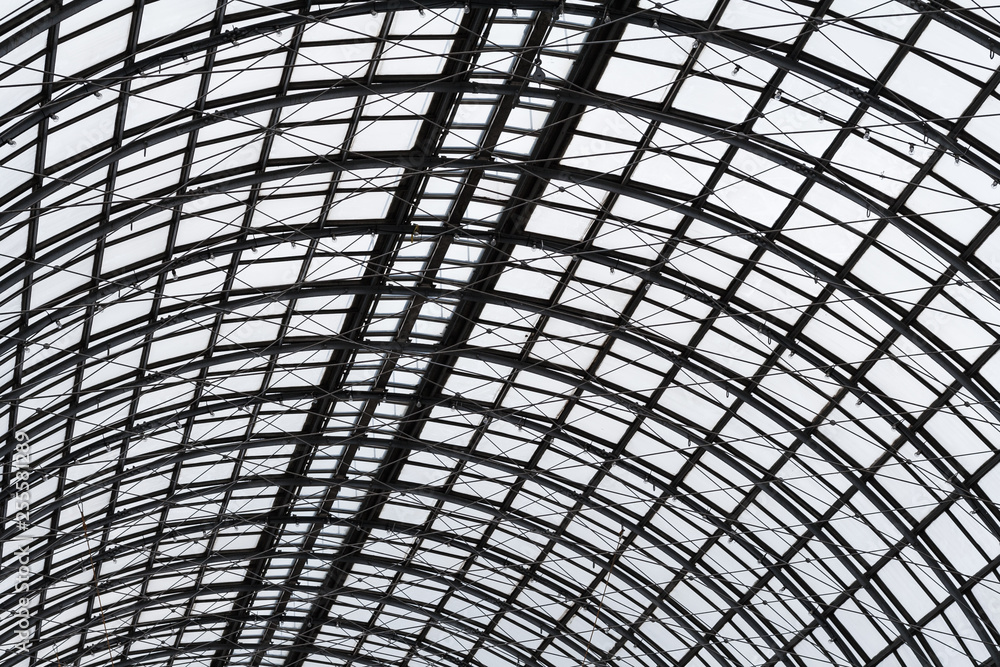 Abstract view to hemispherical ceiling of glass and metal in modern building as background, texture Abstract view to hemispherical ceiling of glass and metal in modern building as background, texture