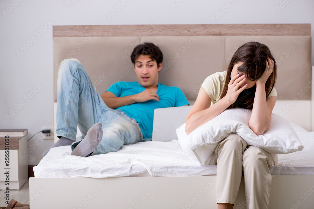 Woman feeling lonely with husband Woman feeling lonely with husband
