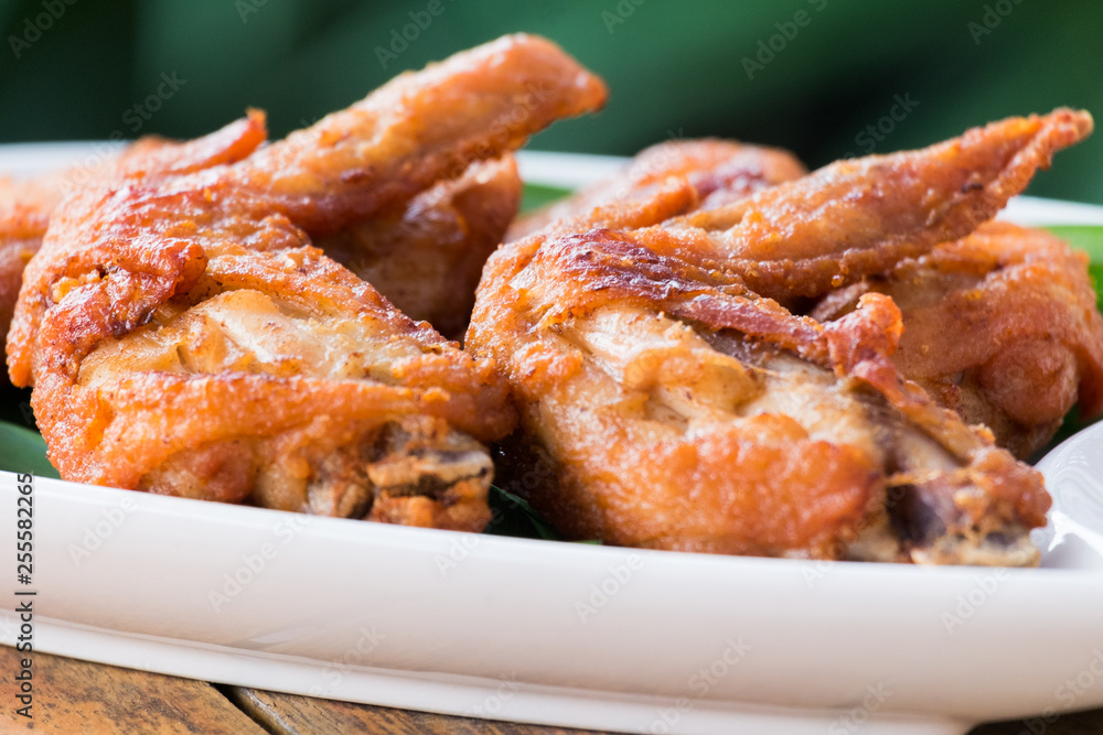 brown skin deep fried chicken wings. brown skin deep fried chicken wings.