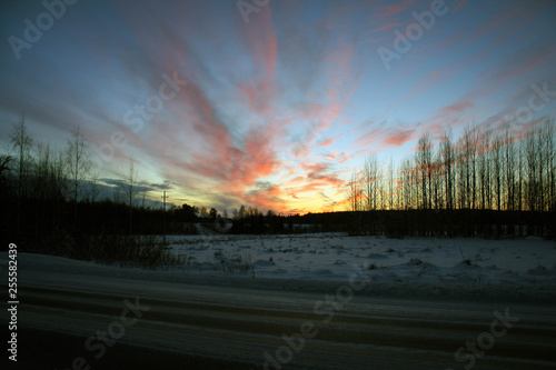 Scenic sunset view by winter, Northern Finland